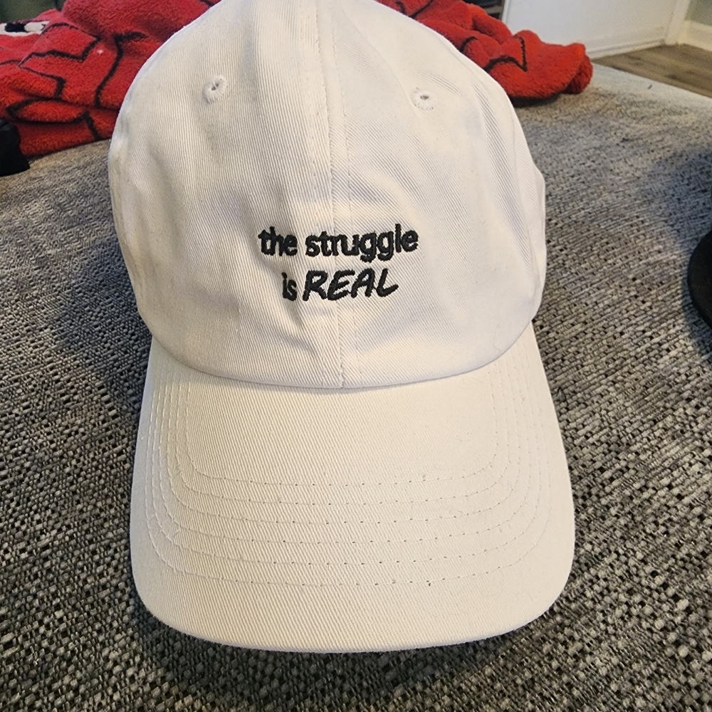 White dad hat with "the struggle is real"